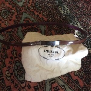 Skinny patent leather Prada belt